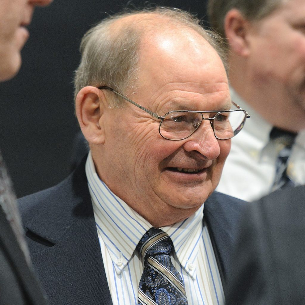 Sen. Gary Dahms smiles during a Senate floor session in 2016